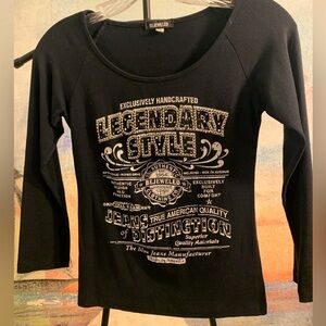 Black, dazzling, crystal and gold metal studded long sleeve from “BeJeweled”